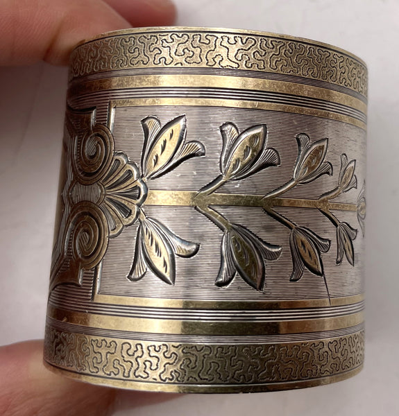 Pair of Gilt Silver Napkin Rings with Finely Engraved Motifs from Late 19th/ Early 20th Century