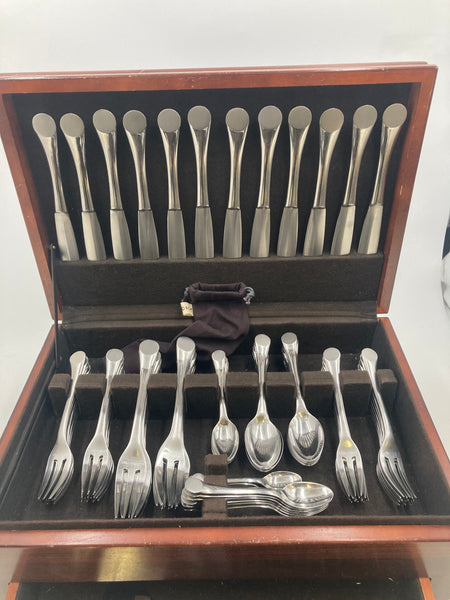 Rare Puiforcat Stainless Steel Flatware Set in Wave Pattern in Art Deco Style