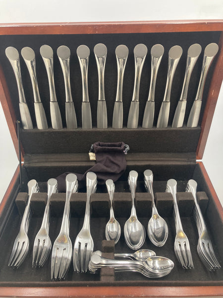Rare Puiforcat Stainless Steel Flatware Set in Wave Pattern in Art Deco Style